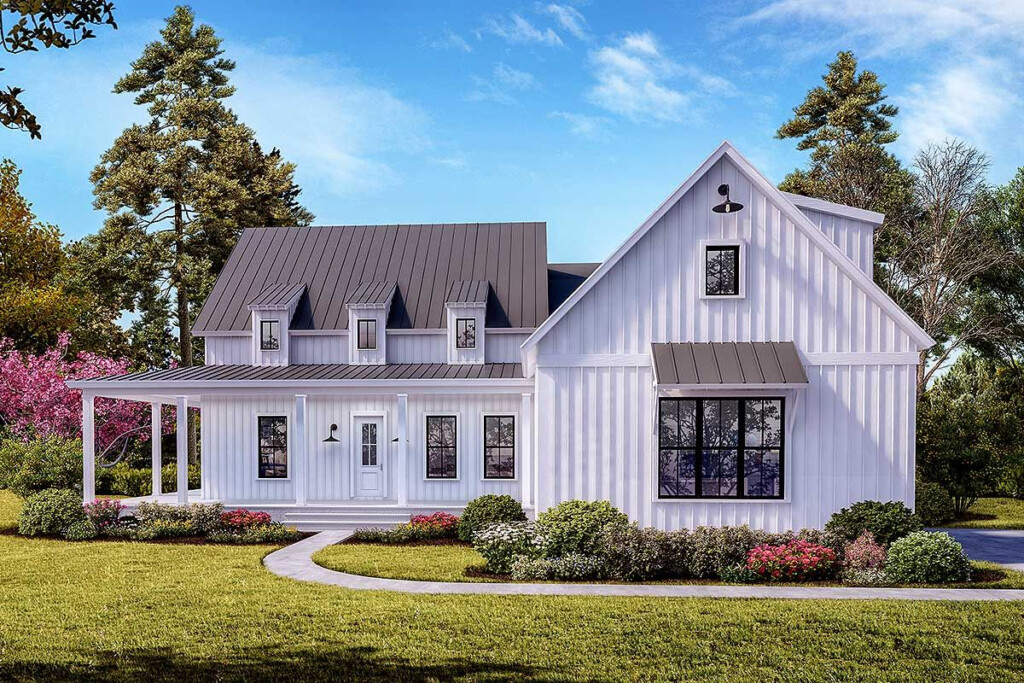 Three Shed Dormers Are Centered Above The Front Porch which Wraps  - 2 Story House Plans With Unique Dormers