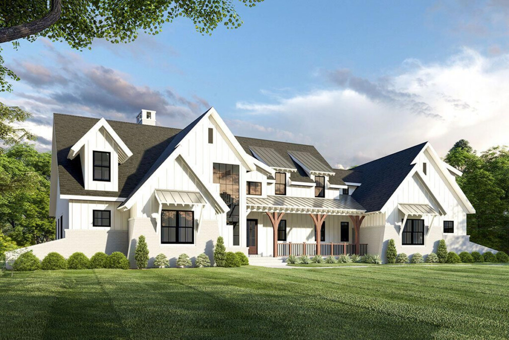 Two Shed Dormers Rest Above The Front Porch And Multiple Gables With  - 2 Story House Plans With Unique Dormers